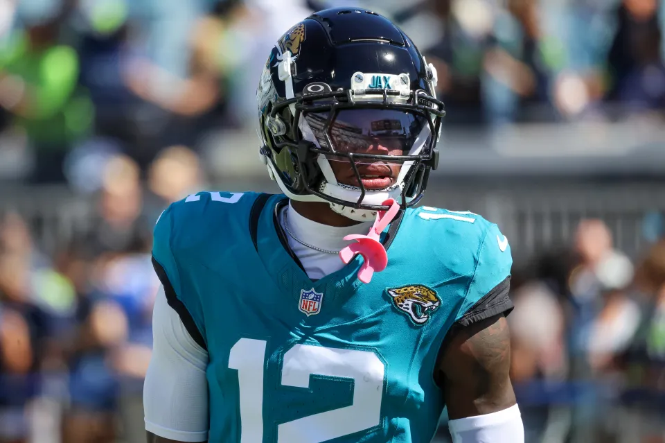 Travis Hunter #12 of the Jacksonville Jaguars warms up prior to the game against the Seattle Seahawks at EverBank Field on October 12, 2025 in Jacksonville, Florida