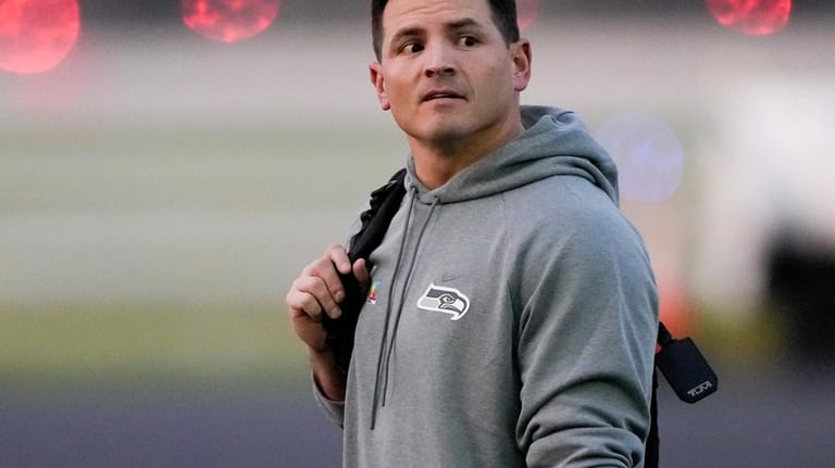 Seattle Seahawks head coach Mike Macdonald arrives, Sunday, Feb. 1,...