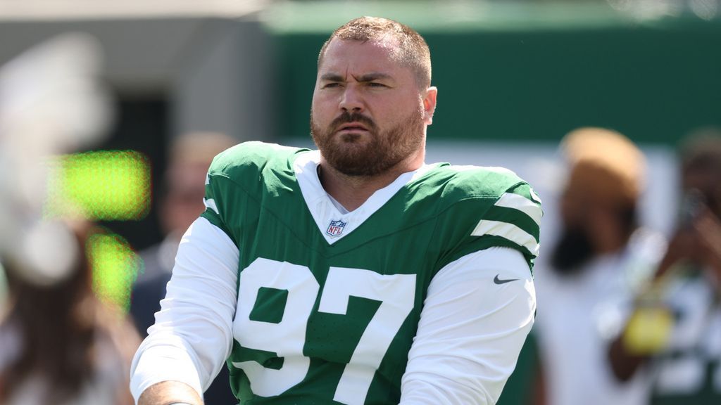 Jets DT Phillips says coach Glenn inherited 'cancerous' group