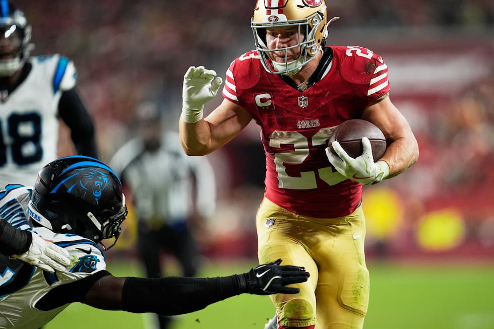 San Francisco 49ers running back Christian McCaffrey runs for a touchdown against the Carolina...