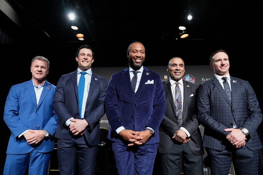 Adam Vinatieri, from left, stands with Luke Kuechly, Larry Fitzgerald, Roger Craig and Drew Brees after being announced for the Pro Football Hall of Fame class of 2026 during football's NFL Honors award show in San Francisco, Thursday, Feb. 5, 2026.