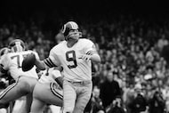 FILE - Washington quarterback Sonny Jurgensen looks to pass against the New York Giants...