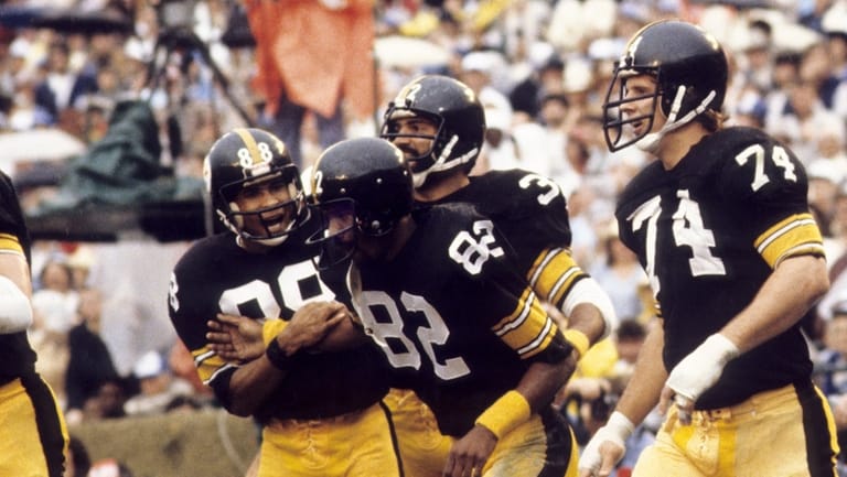 Steelers' John Stallworth, middle, Lynn Swann, left, and Franco Harris, back...