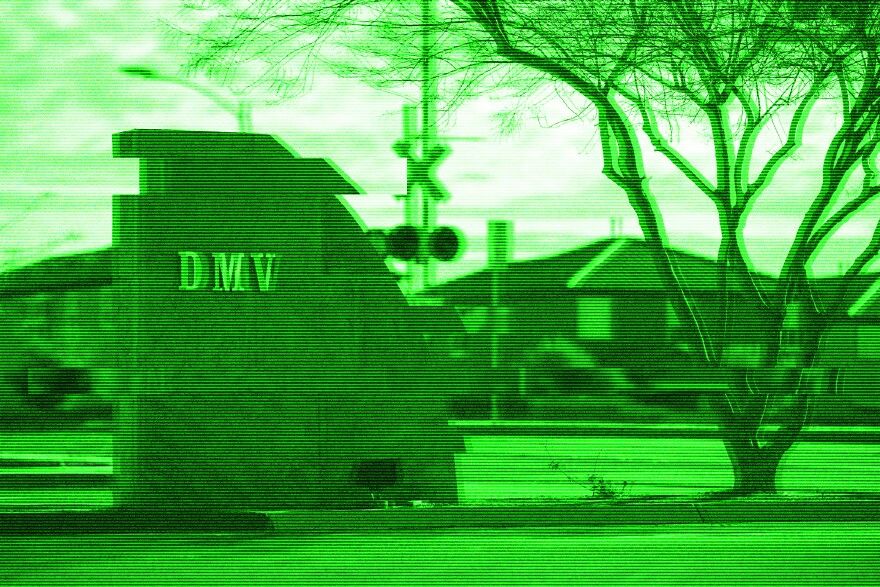 A green glitching brick DMV sign in Henderson 