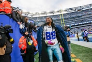 Dallas Cowboys wide receiver Ceedee Lamb (88) looks up at fans at the end of an NFL game...