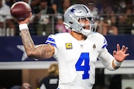 Dallas Cowboys quarterback Dak Prescott (4) throws a nine-yard pass to wide receiver George...