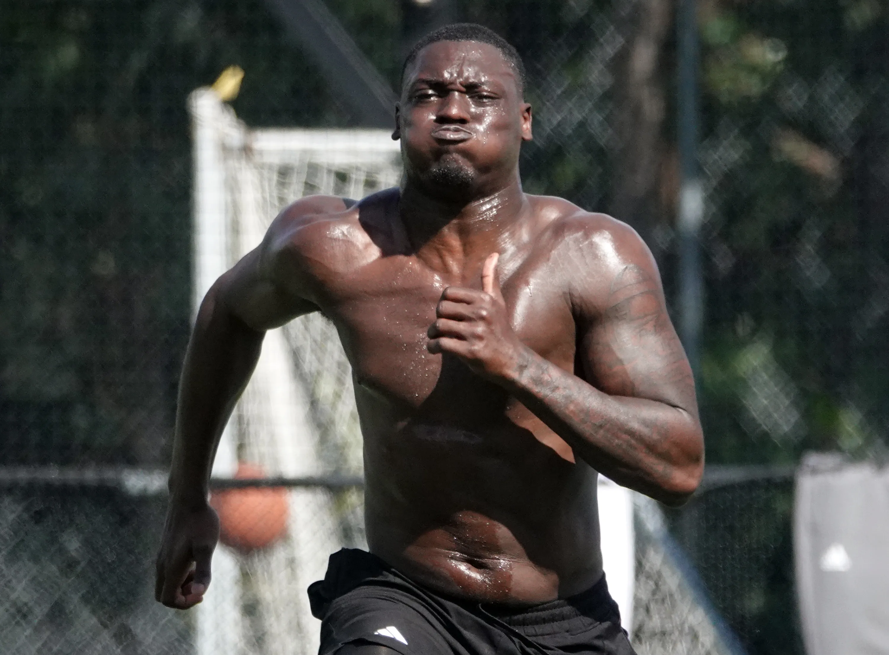 University of Miami linebacker Wesley Bissainthe works out at Bommarito...