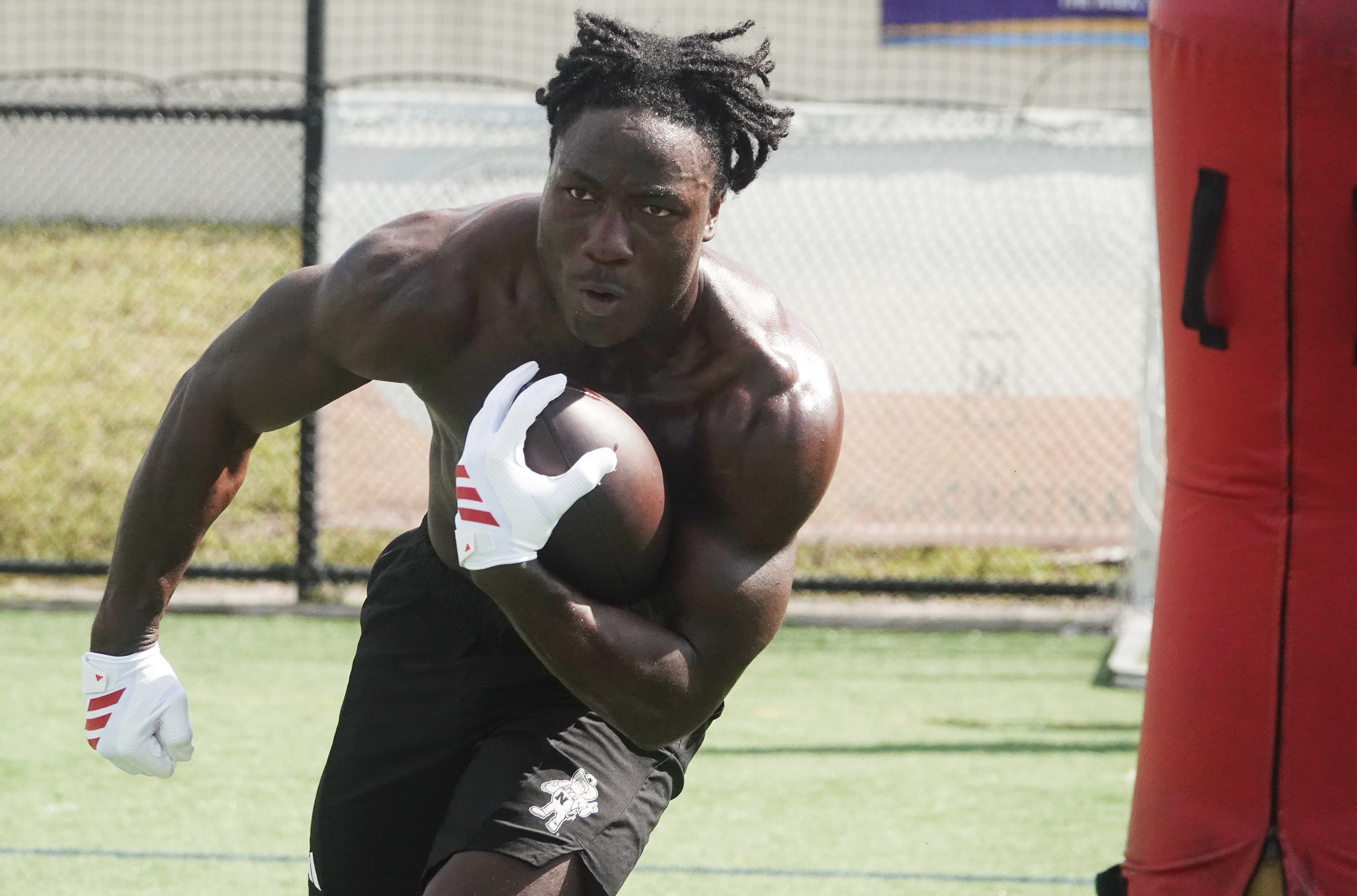 Nebraska running back Emmett Johnson works out at Bommarito Performance...