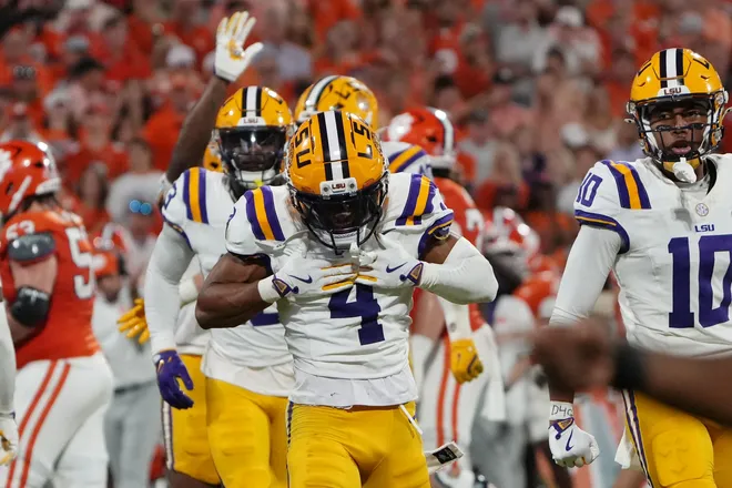 Aug 30, 2025; Clemson, South Carolina, USA; LSU Tigers cornerback Mansoor Delane (4) celebrates after a play against the Clemson Tigers during the second half at Memorial Stadium. Mandatory Credit: Ken Ruinard-USA TODAY Network via Imagn Images