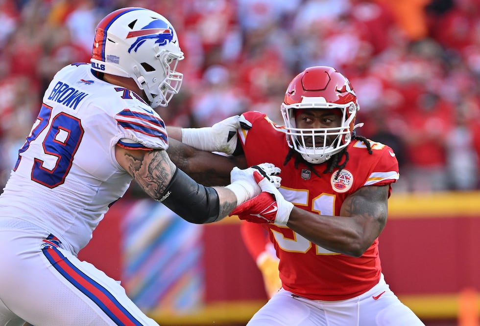 Kansas City Chiefs defensive end Mike Danna (51) rushes on defense during an NFL football game...