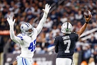 Dallas Cowboys defensive end Jadeveon Clowney (42) pressures Las Vegas Raiders quarterback...