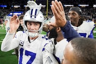 Dallas Cowboys kicker Brandon Aubrey (17) celebrates with teammates including defensive...