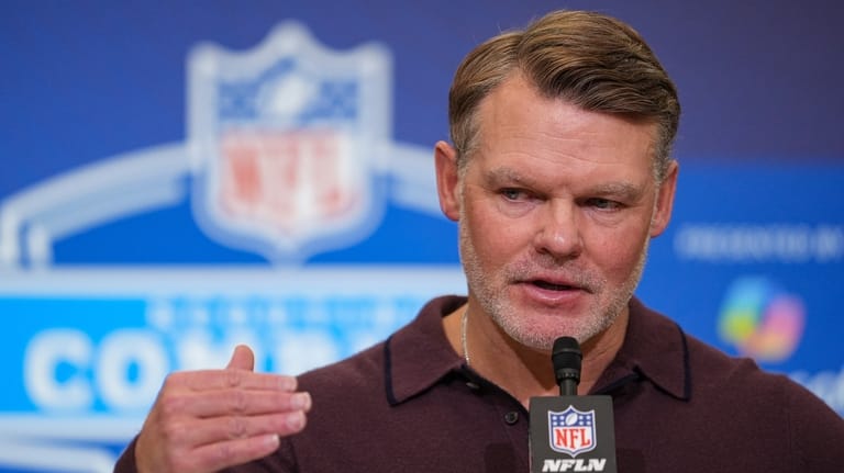 Indianapolis Colts general manager Chris Ballard speaks during a press...