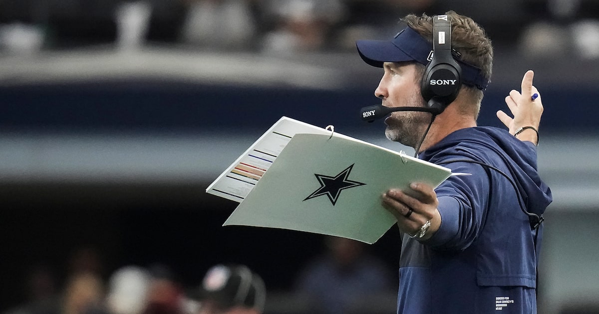 What grade did Brian Schottenheimer receive after first year as Cowboys HC?