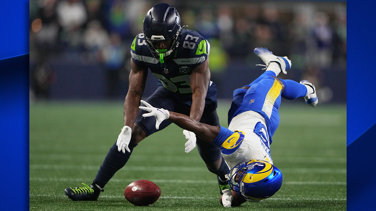 Seahawks wide receiver Dareke Young recovers a fumbled punt return by Los Angeles Rams wide receiver Xavier Smith during the NFC Championship on Jan. 25, in Seattle.