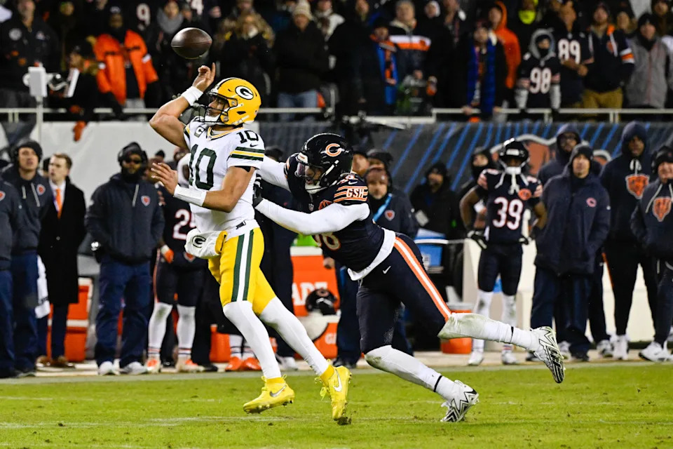 Green Bay Packers QB Jordan Love tries to escape pressure from defenderMatt Marton-Imagn Images