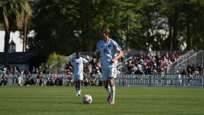 Chicago Fire's Anton Salétros in the preseason against the LA Galaxy with teammate Mbekezeli Mbokazi in the background