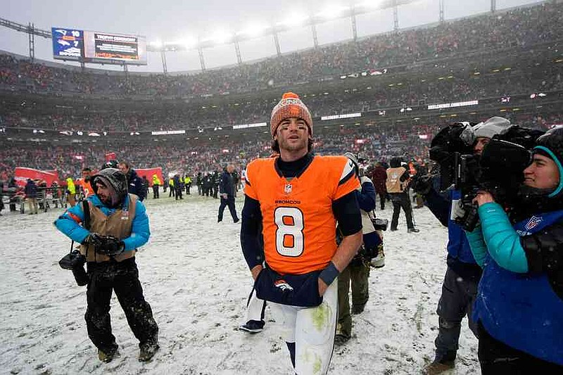 Denver Broncos quarterback Jarrett Stidham leaves the field after the AFC Championship NFL football game between the Denver Broncos and the New England Patriots, Sunday, Jan. 25, 2026, in Denver. (AP Photo/John Locher)