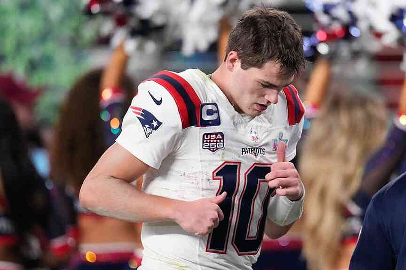New England Patriots quarterback Drake Maye walks off the field after a loss to the Seattle Seahawks in the NFL Super Bowl 60 football game, Sunday, Feb. 8, 2026, in Santa Clara, Calif. (AP Photo/Mark J. Terrill)