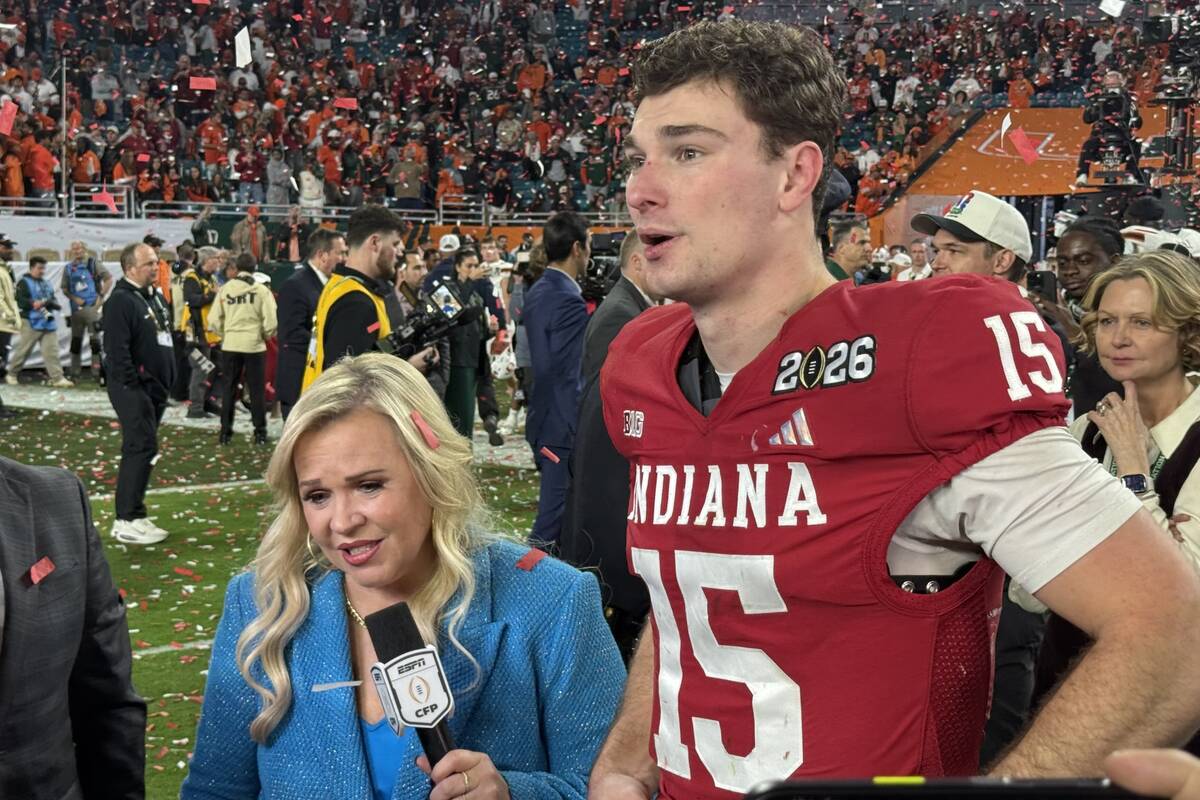 ESPN reporter Holly Rowe (left) interviews Indiana quarterback Fernando Mendoza following the C ...