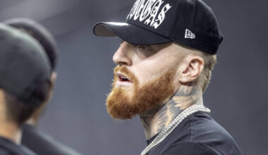 Raiders defensive end Maxx Crosby looks on as the team warms up before an NFL game against the ...