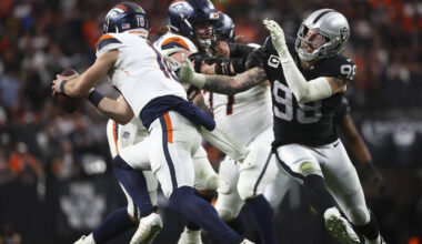 Raiders defensive end Maxx Crosby (98) chases after Denver Broncos quarterback Bo Nix (10) duri ...