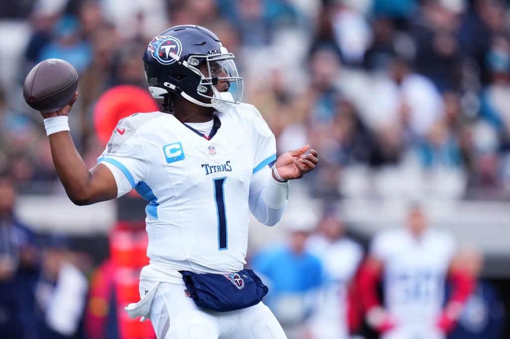 Cam Ward #1 of the Tennessee Titans throws a pass during the first quarter against the Jacksonville Jaguars at EverBank Stadium on January 04, 2026 in Jacksonville, Florida.