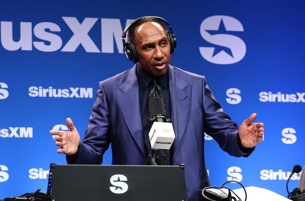 Stephen A. Smith speaking at the SiriusXM booth.