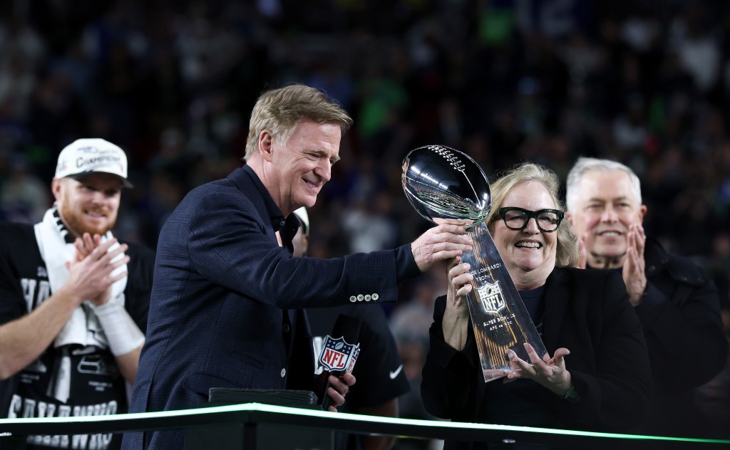 NFL Commissioner Roger Goodell hands the Vince Lombardi Trophy to Jody Allen of the Seattle Seahawks after the Seattle Seahawks won Super Bowl LX at Levi's Stadium on February 08, 2026 in Santa Clara, California.