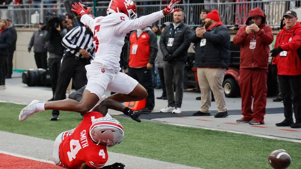 Indiana defensive back D'Angelo Ponds, top, breaks up a pass intended for Ohio State receiver Jeremiah Smith during the first half of an NCAA college football game Saturday, Nov. 23, 2024, in Columbus, Ohio. (AP Photo/Jay LaPrete)