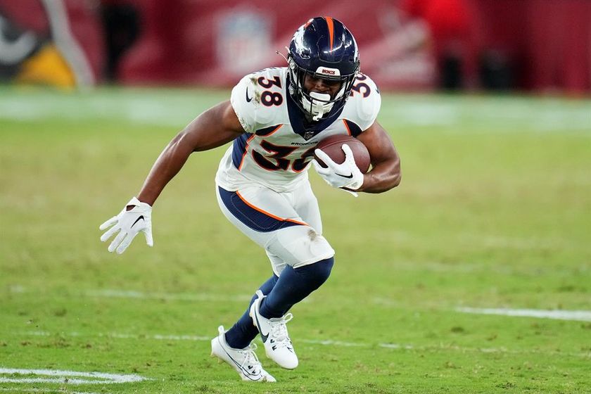Denver Broncos running back Jaleel McLaughlin runs with the ball against the Arizona Cardinals during the second half of an NFL preseason football game, Friday, Aug. 11, 2023, in Glendale, Ariz.
