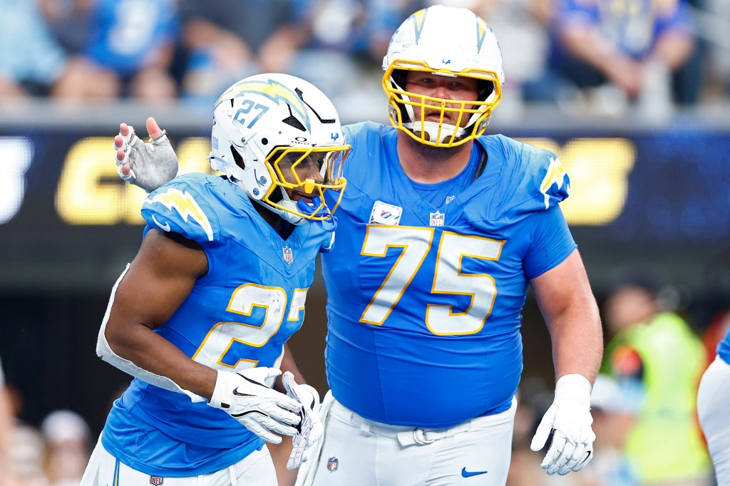 J.K. Dobbins and Bradley Bozeman celebrate Dobbins' rushing touchdown.