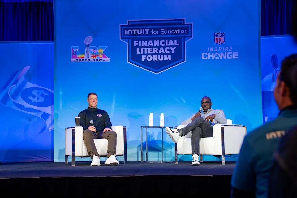 49ers running back Christian McCaffrey speaks to Intuit's Greg Johnson about financial literacy in front of hundreds of Bay area high school students. Feb. 3, 2026.