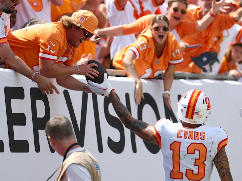 Sep 21, 2025; Tampa, Florida, USA; Tampa Bay Buccaneers wide receiver Mike Evans (13) gives his touchdown ball to a fan during a game against the New York Jets in the second quarter at Raymond James Stadium. Mandatory Credit: Nathan Ray Seebeck-Imagn ImagesNathan Ray Seebeck-Imagn Images