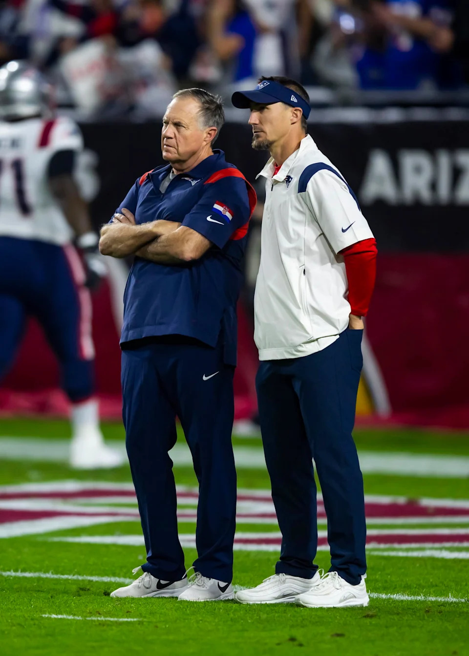 Dec 12, 2022; Glendale, Arizona, USA; New England Patriots head coach Bill Belichick with special teams coordinator Cameron Achord against the Arizona Cardinals iat State Farm Stadium. Mandatory Credit: Mark J. Rebilas-Imagn Images.