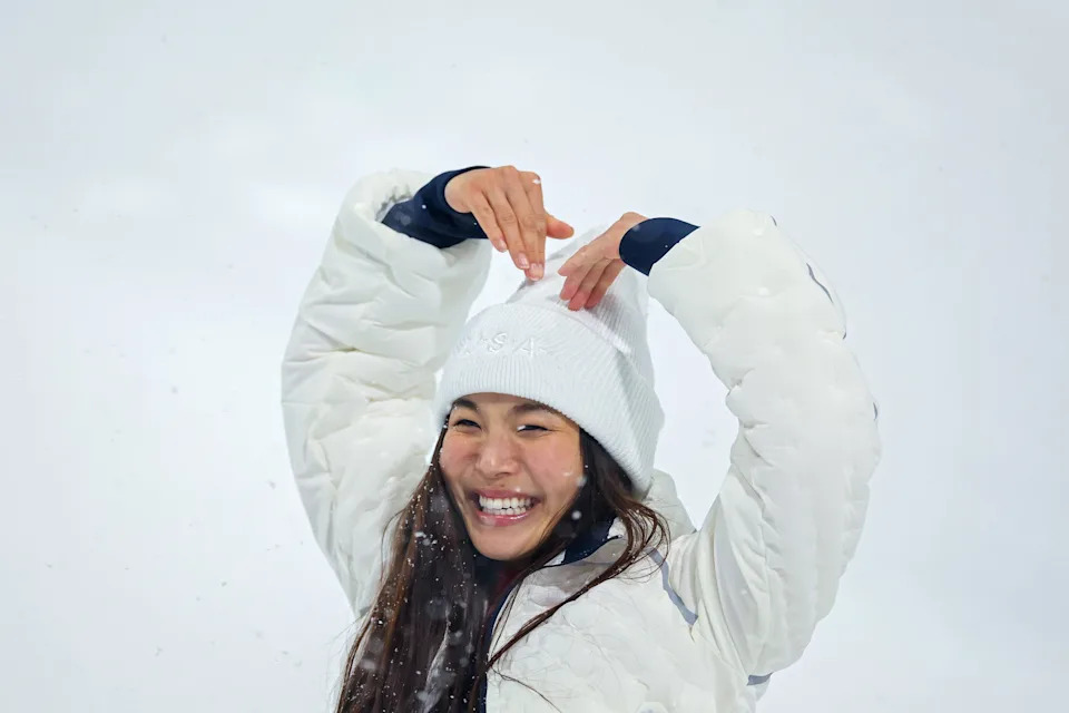 Silver medalist Chloe Kim of Team United States celebrates during the medal ceremony.