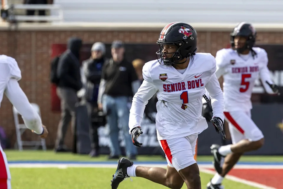 Jan 29, 2026; Mobile, AL, USA; National wide receiver Caullin Lacy (1) of Louisville runs a route during National Senior Bowl practice at Hancock Whitney Stadium. Mandatory Credit: Vasha Hunt-Imagn Images