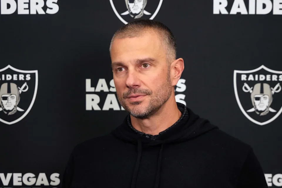 Las Vegas Raiders general manager John SpytekKirby Lee-Imagn Images