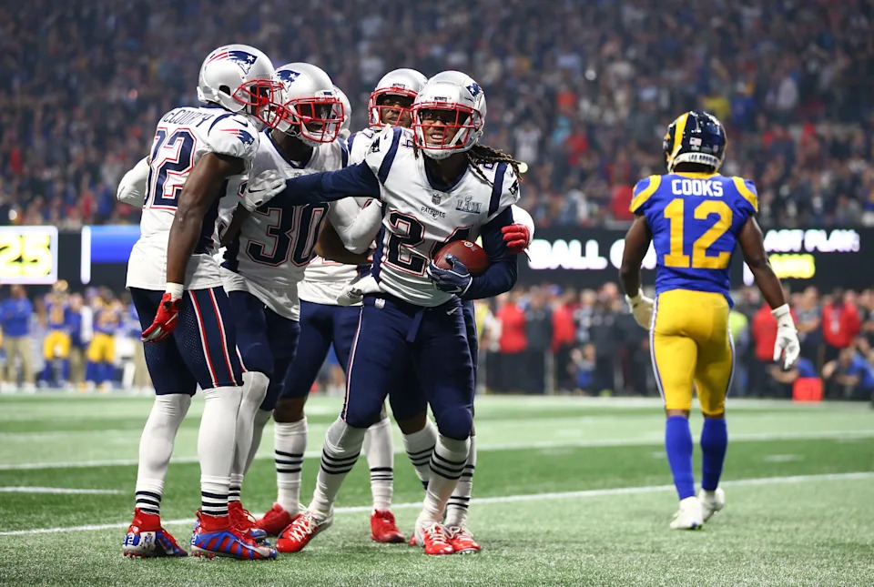 Feb 3, 2019; Atlanta, GA, USA; New England Patriots cornerback Stephon Gilmore (24) celebrates with teammates after intercepting a pass intended for Los Angeles Rams wide receiver Brandin Cooks (12) in the fourth quarter in Super Bowl LIII at Mercedes-Benz Stadium. Mandatory Credit: Mark J. Rebilas-USA TODAY Sports