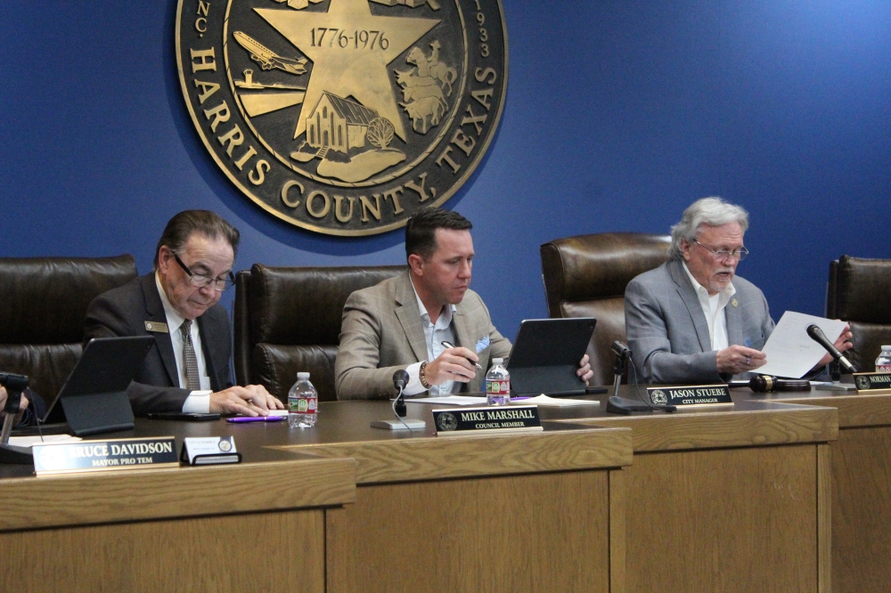 Pictured during Humble City Council's February 12 meeting is council member Mike Marshall (left), City Manager Jason Stuebe (center) and Mayor Norman Funderburk (right).