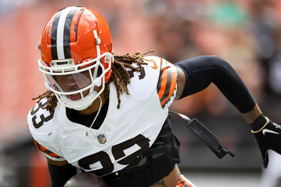 <p>Cleveland Browns safety Ronnie Hickman (33) runs the ball during warm ups before the game against the Green Bay Packers at Cleveland Browns Stadium. Mandatory Credit: Scott Galvin-Imagn Images</p>