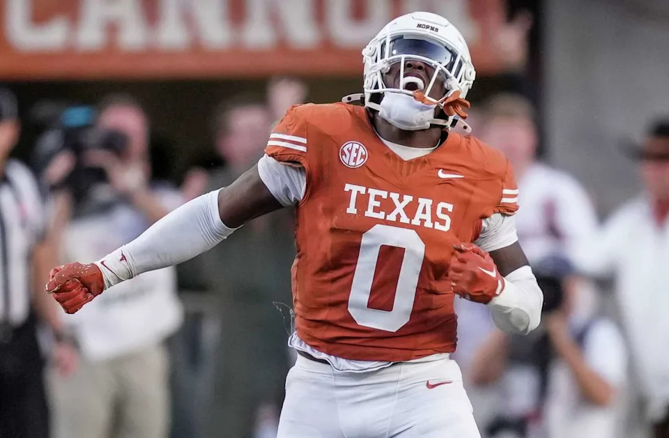 Texas Longhorns linebacker Anthony Hill Jr. (0) celebrates a stop on fourth down against Kentucky Wildcats in the third quarter during the second half of an NCAA college football game at Darrell K Royal Texas Memorial Stadium, Austin, Texas, Saturday, Nov 24, 2024. (Ricardo B. Brazziell/American-Statesman)