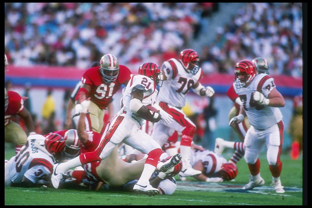 22 Jan 1989: Running back James Brooks #21 of the Cincinnati Bengals has help moving through the San Francisco line at Super Bowl XXIII at the Joe Robbie Stadium in Miami, Florida. The 49ers won, 20-16