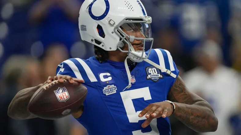 Anthony Richardson warms up on the field before a Colts game.