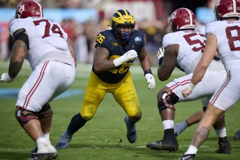 December 31, 2024: Michigan defensive lineman Rayshaun Benny 26 rushing on defense during an NCAA, College League, USA football game between the Michigan Wolverines and Alabama Crimson Tide at Raymond James Stadium in Tampa, Florida. /CSM Tampa United States – ZUMAc04_ 20241231_faf_c04_132 Copyright: xMikexJanesx