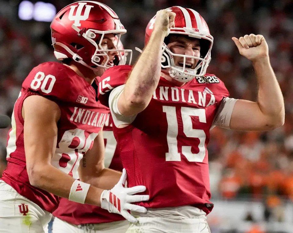 Fernando Mendoza (15) celebrates with his teammates after rushing for a touchdown during Indiana’s win over Miami in the national championship. Grace Hollars/IndyStar / USA TODAY NETWORK via Imagn Images