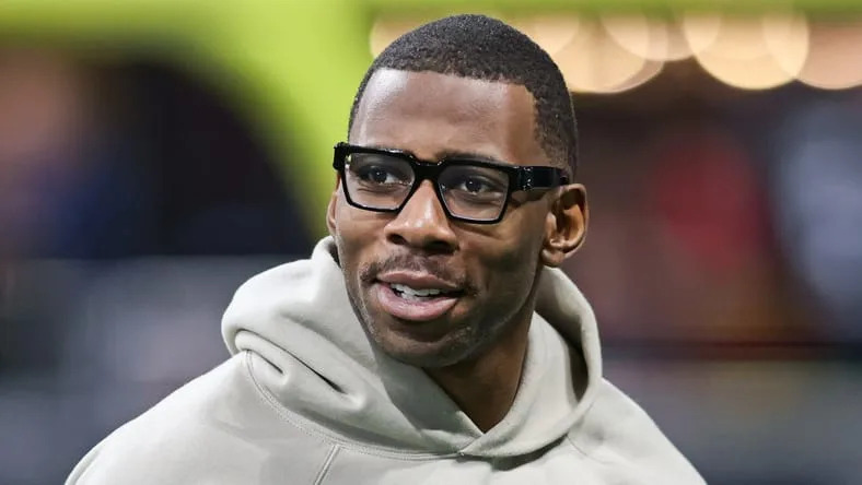 Kyle Pitts on the field before a game at Mercedes-Benz Stadium.