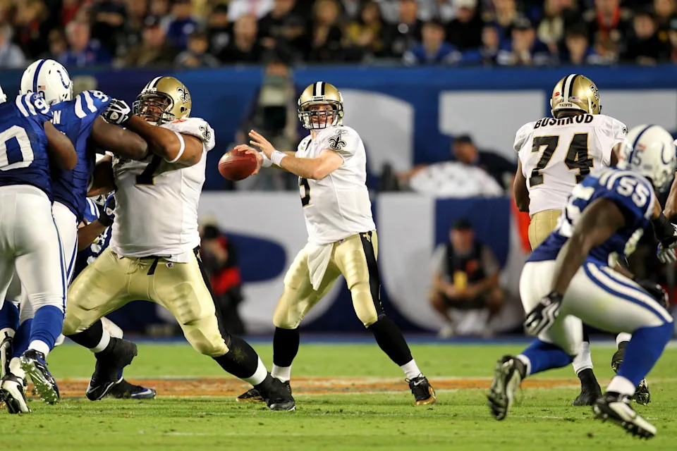 New Orleans Saints quarterback Drew Brees (9) drops back to throw against the Indianapolis Colts during the third quarter of Super Bowl XLIV at Sun Life Stadium. <br>John David Mercer-Imagn Images