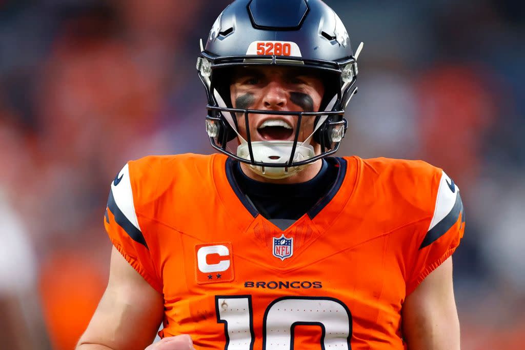 Bo Nix of the Denver Broncos celebrates after throwing a touchdown pass. Getty