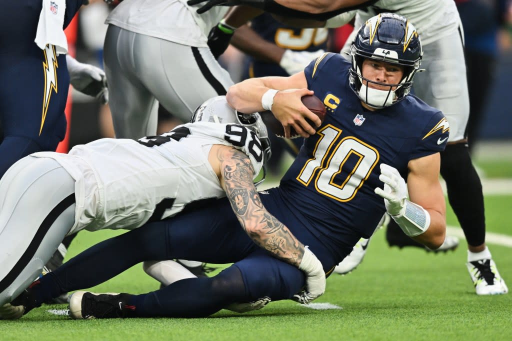 Las Vegas Raiders defensive end Maxx Crosby sacks Los Angeles Chargers quarterback Justin Herbert in an NFL football game, Sunday, Nov. 30, 2025, in Inglewood, Calif. AP